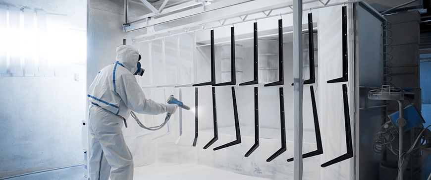 Industrial powder coating process in action